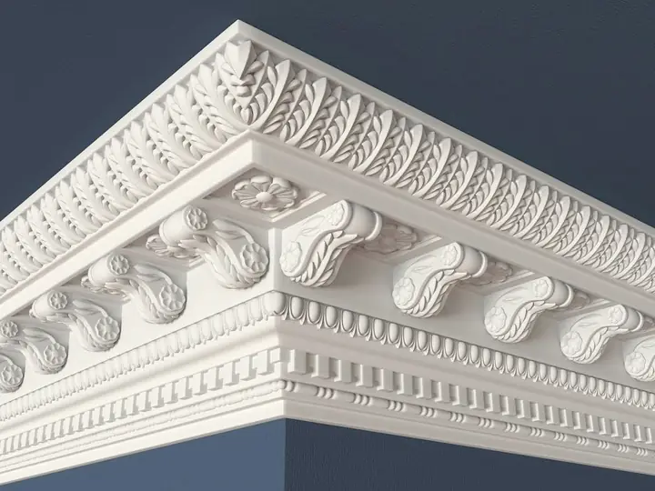 Ornate white gypsum cornice with leaf and scroll detail