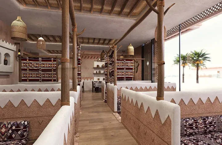 Heritage-style majlis seating with timber beams and textured walls